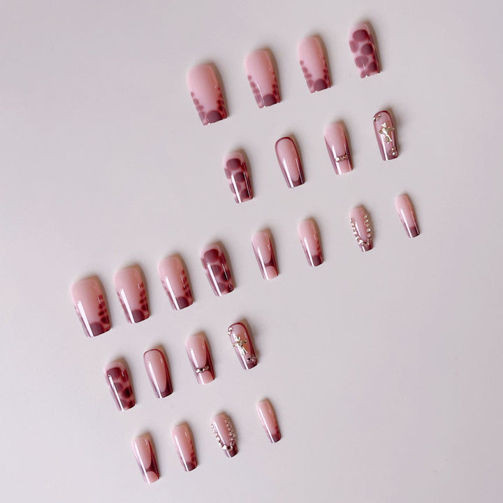Nail art set with modern leopard patterns and sparkling accents Stornfield