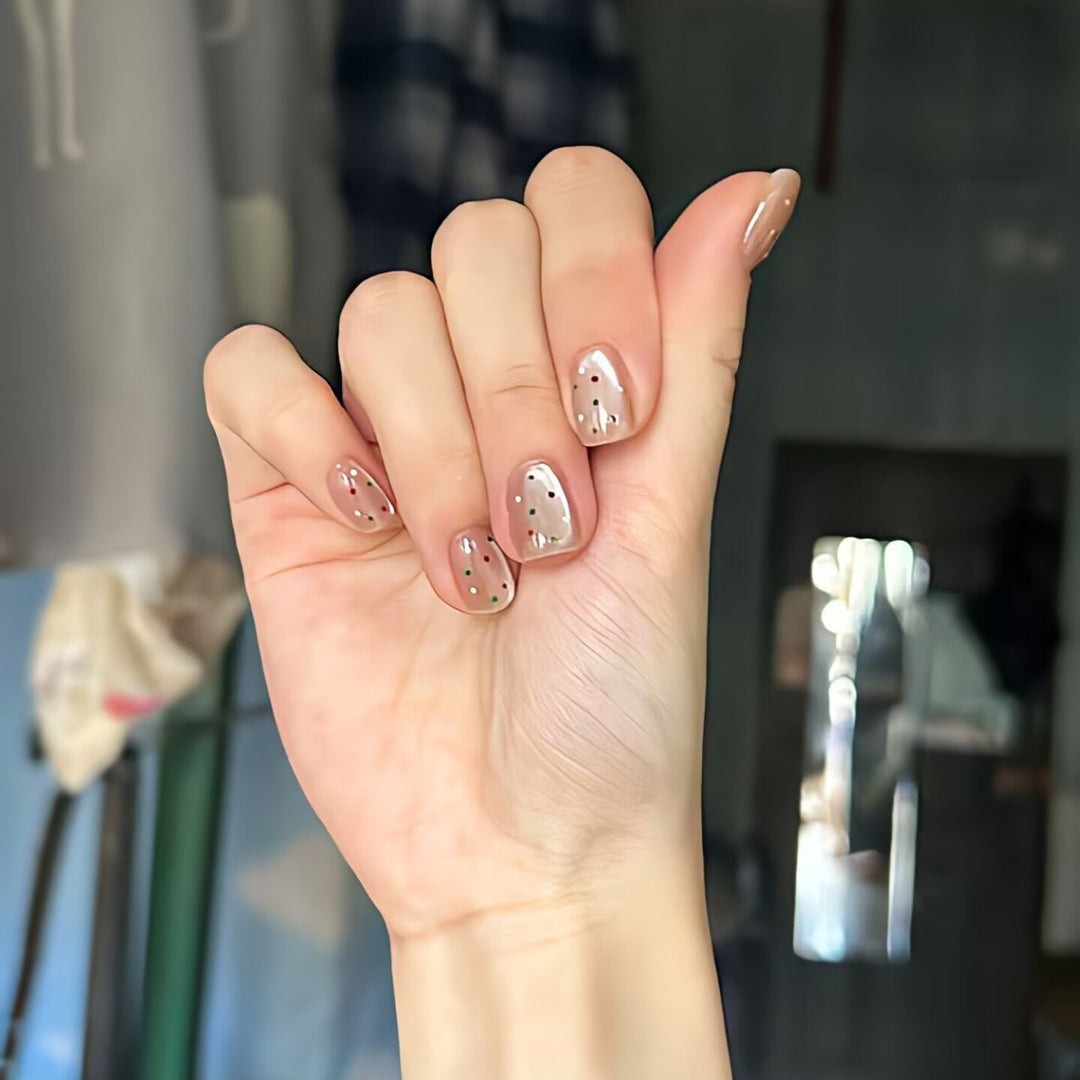 Trendy artificial nails with glitter effects Stornfield