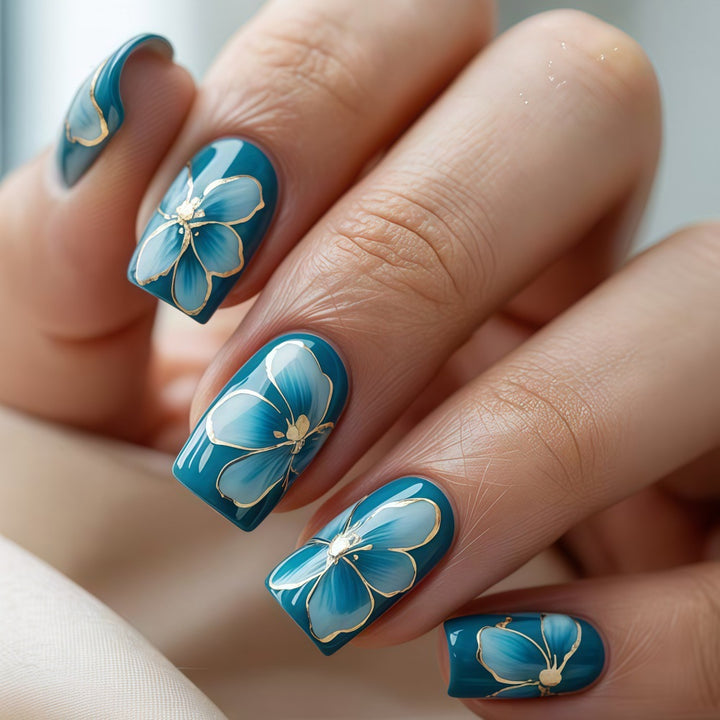 Elaborately designed artificial nails with flower pattern Stornfield