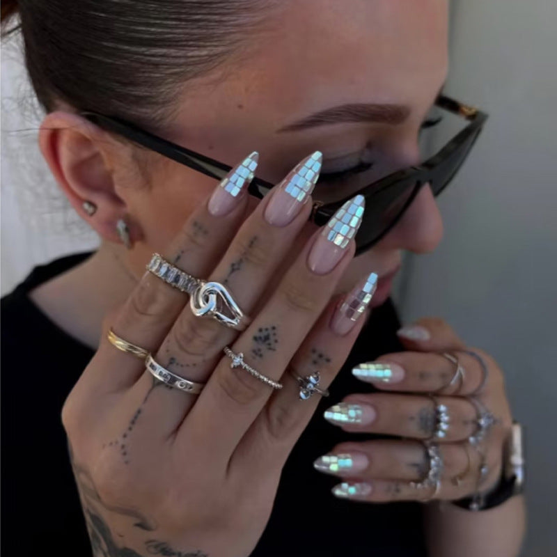 Artificial nail set with shimmering geometric accents Stornfield