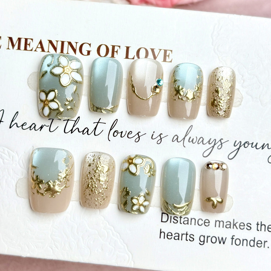 Artistic Press-On Nail Set with Elegant Floral Design