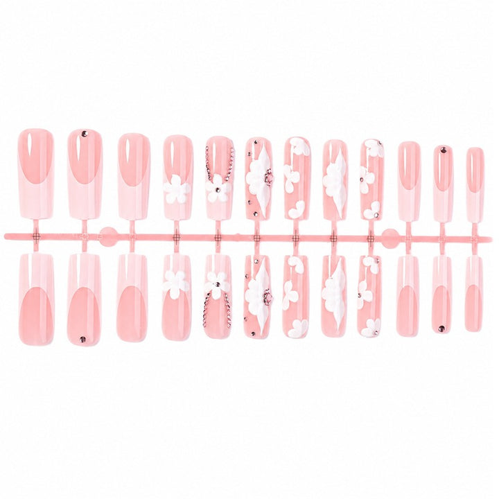 Nail Art Set with Floral Accents and Glitter Stornfield