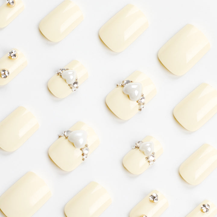 Artistic Nail Extensions with Elegant Decorative Details Stornfield