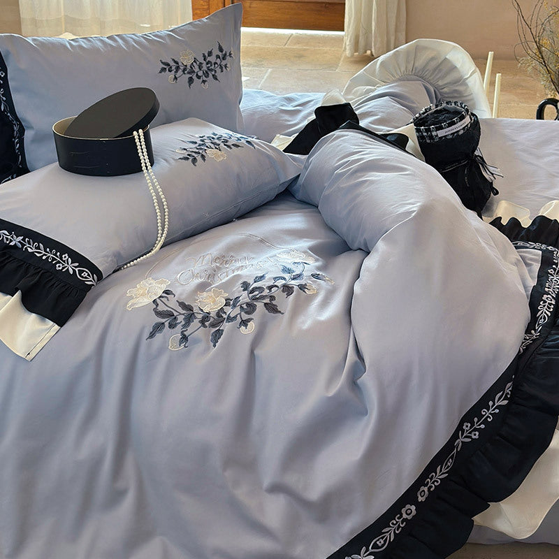 Elegant bed linen set made of cotton satin with embroidery, contrasting frill and round cushion