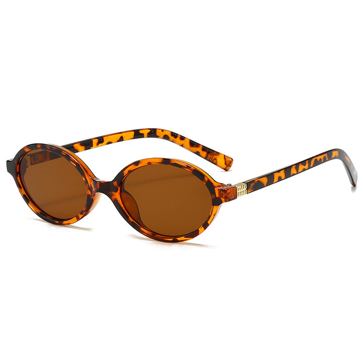 Women's fashionable oval glasses with golden accents Stornfield