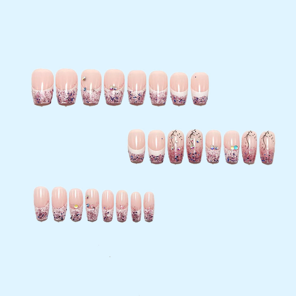 Glittering artificial nails with elegant tip and sparkling accents Stornfield