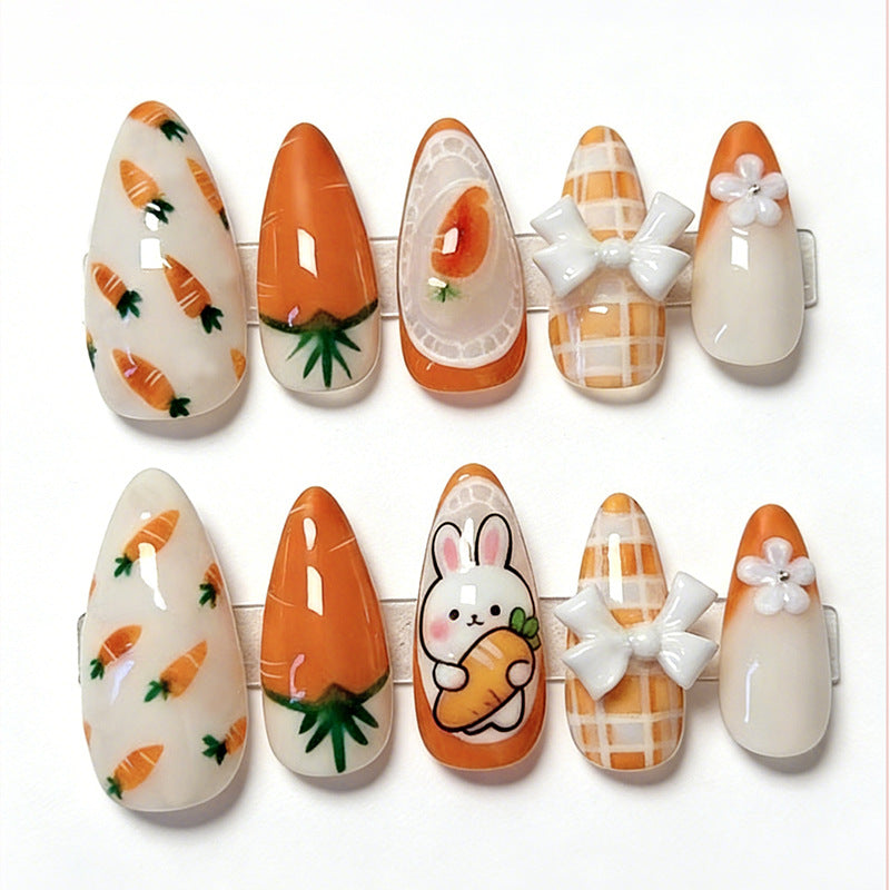 Artificial nail set with spring-like carrot and rabbit pattern Stornfield