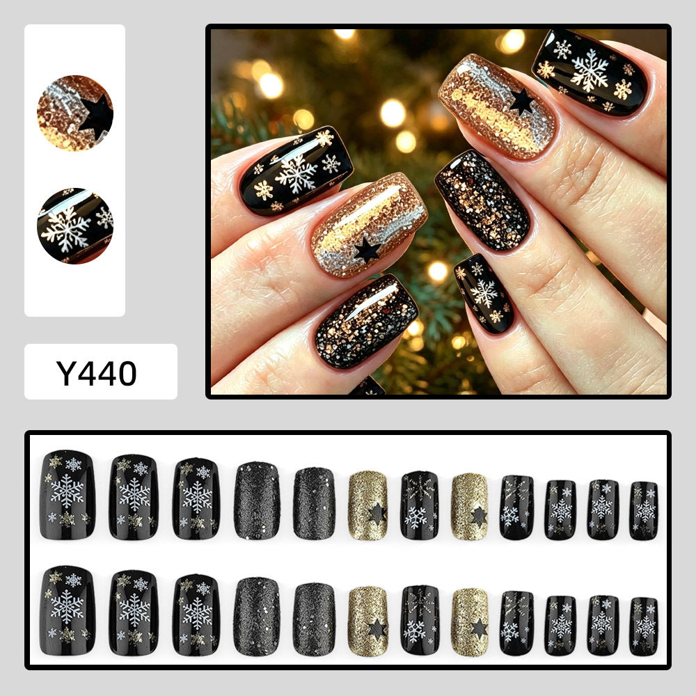 Creative artificial nails with sparkling glitter and festive winter design Stornfield
