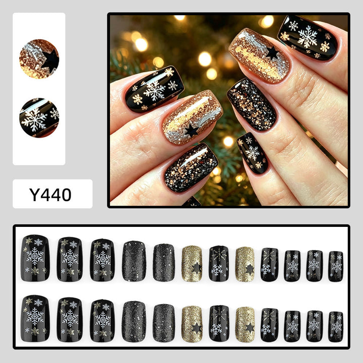 Creative artificial nails with sparkling glitter and festive winter design Stornfield
