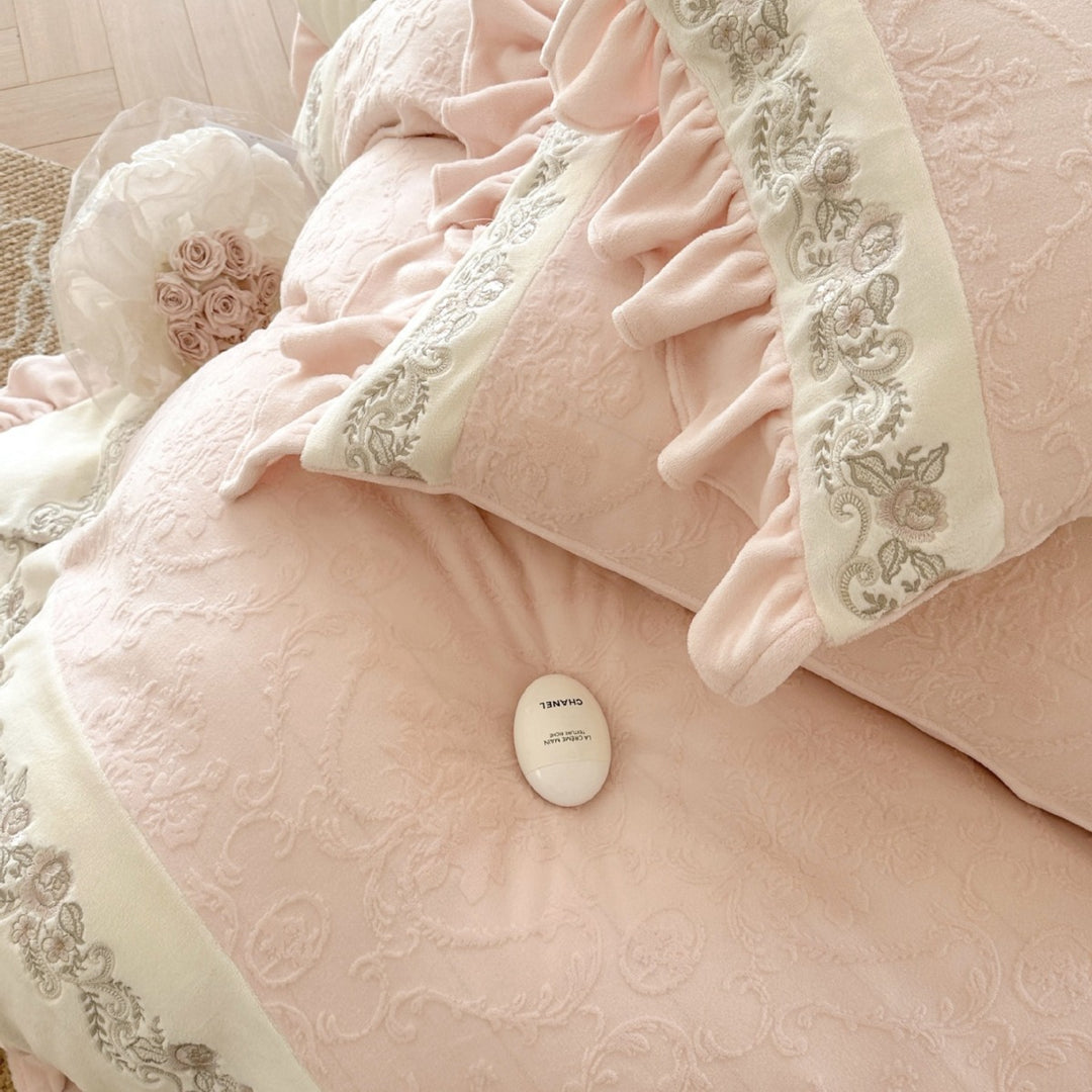 Quilted cotton duvet cover set with ruffle, embroidery border, and decorative quilted texture