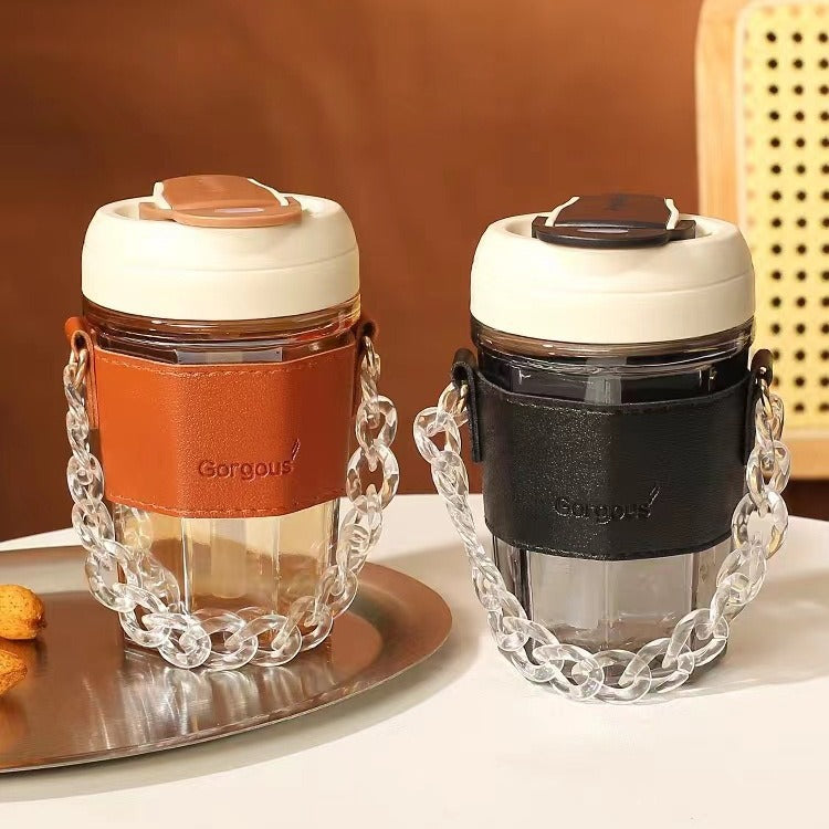 Women drinking cup with elegant leather handle and practical carrying chain Stornfield