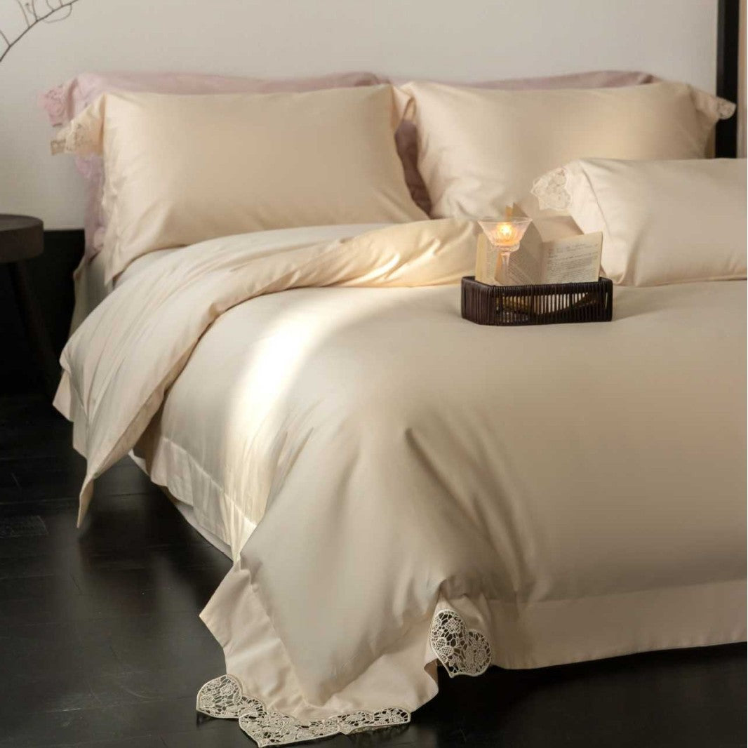 Satin bedding set with lace heart appliqué
