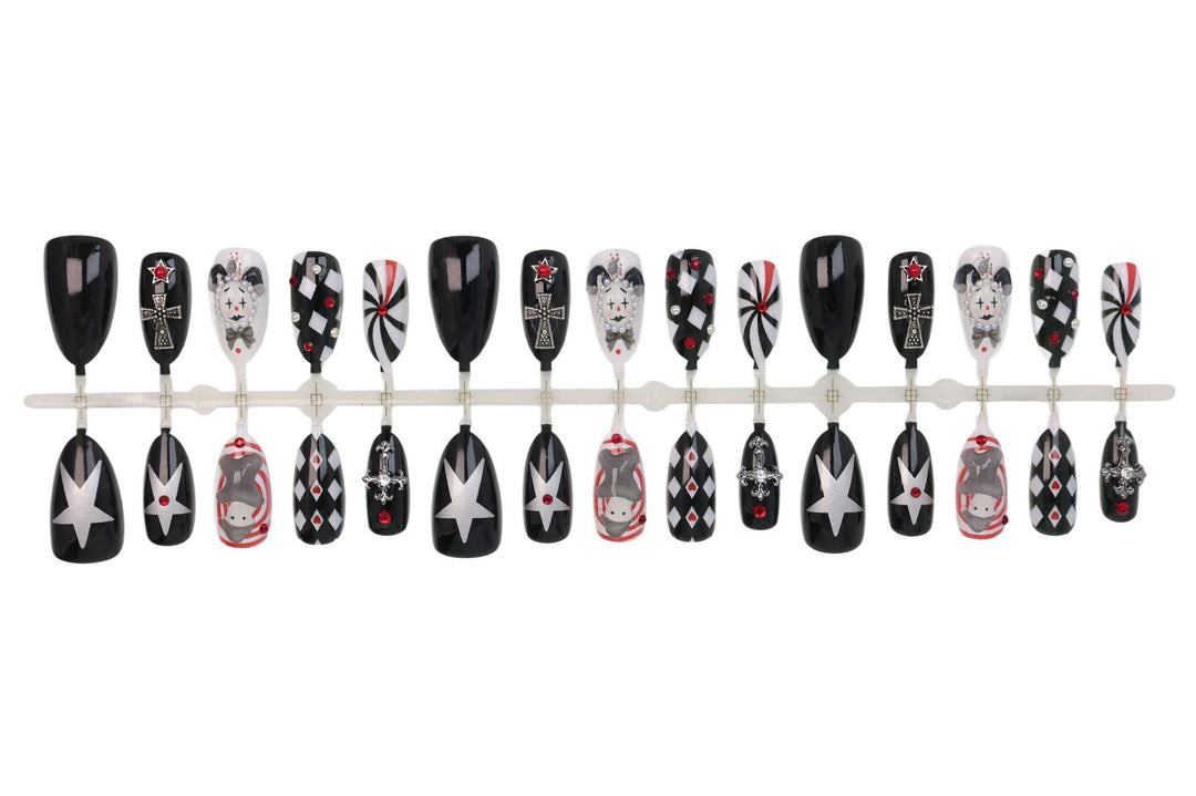 Nail art set with creative Halloween motifs and elegant accents Stornfield