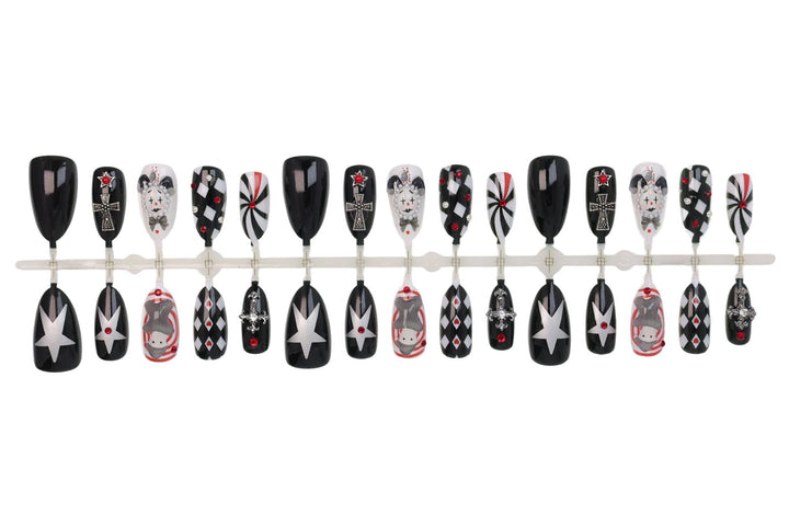 Nail art set with creative Halloween motifs and elegant accents Stornfield