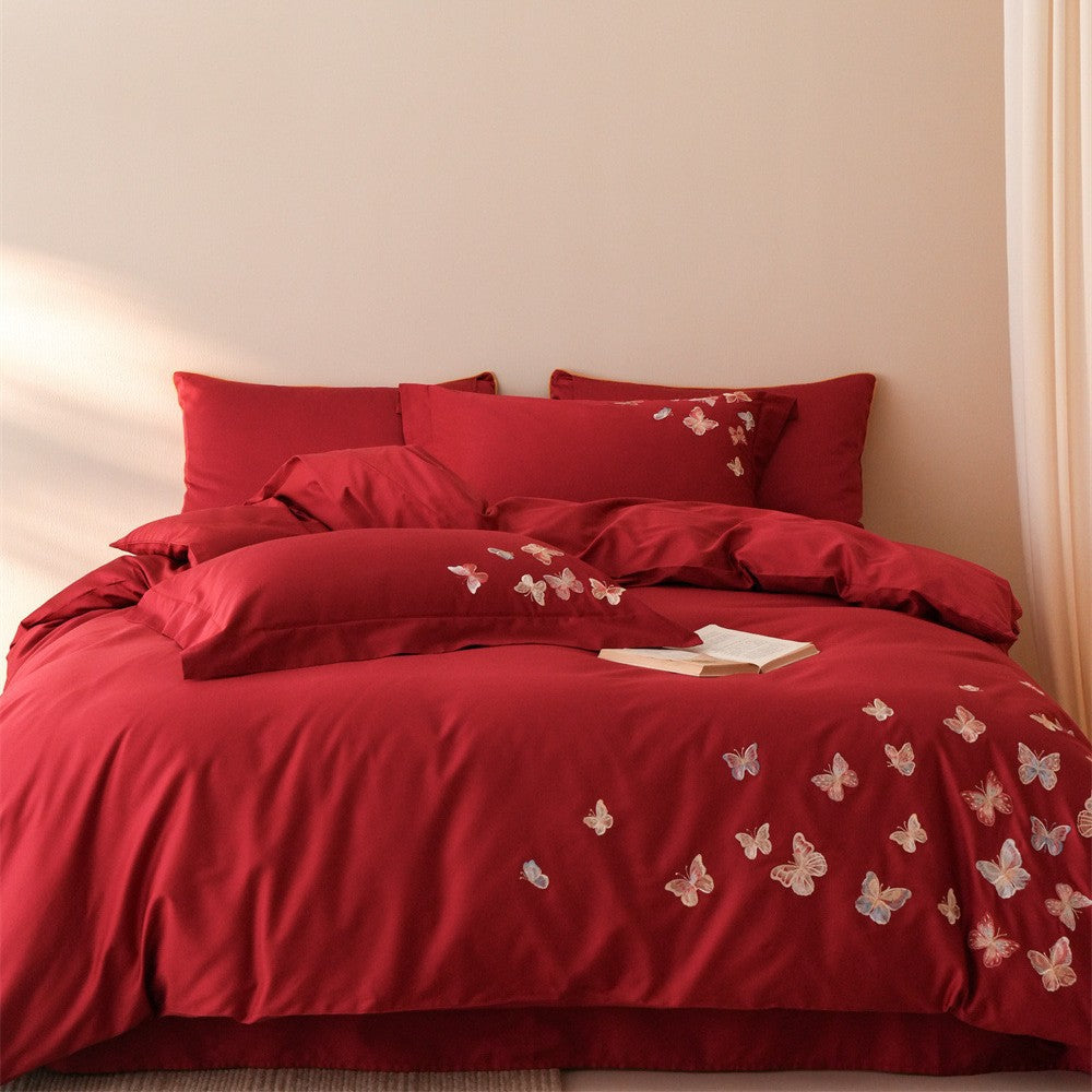 Embroidered bedding set made of cotton satin with butterfly appliqué