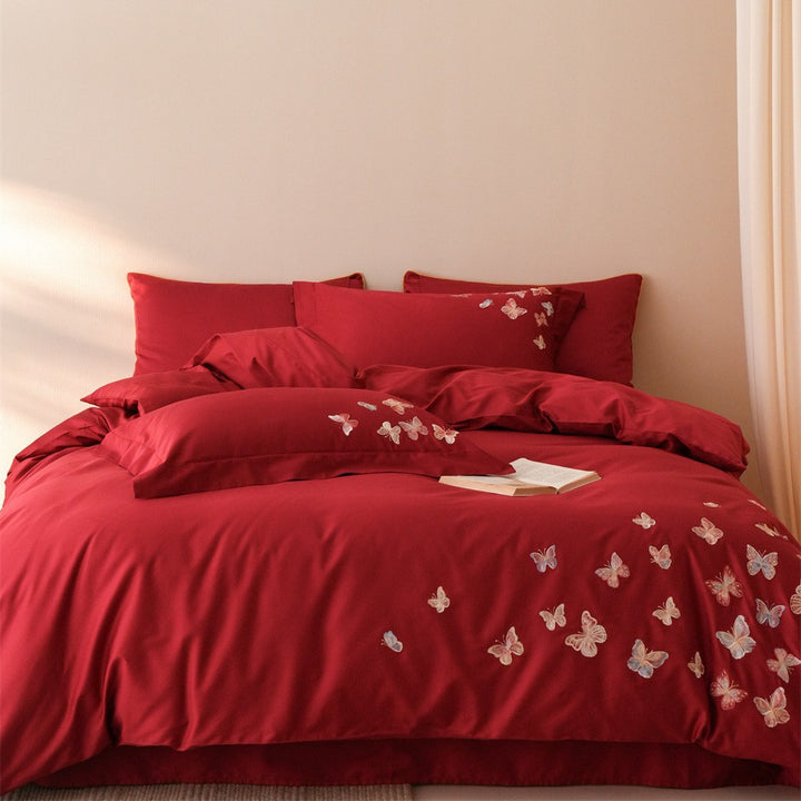 Embroidered bedding set made of cotton satin with butterfly appliqué