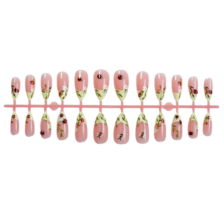 Artificial nail set with delicate flower and ladybird pattern Stornfield