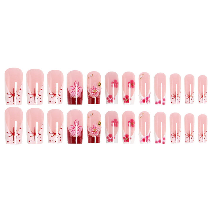 Artificial nail set with floral detail and glitter effects Stornfield