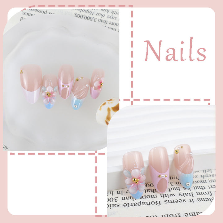 Artificial nail set with romantic floral motifs and elegant accents Stornfield