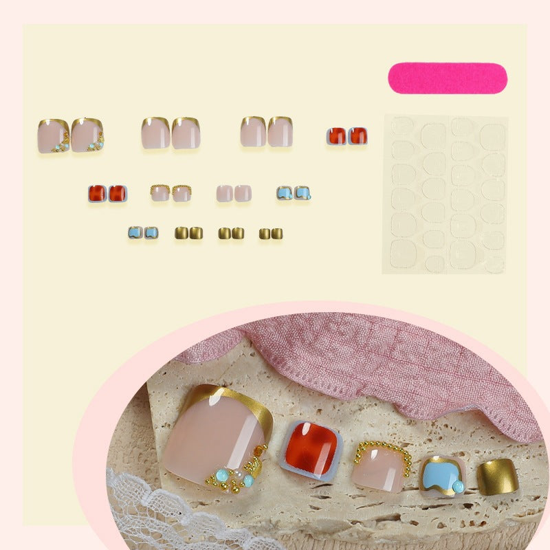 Artificial nail set with elegant gold accents Stornfield