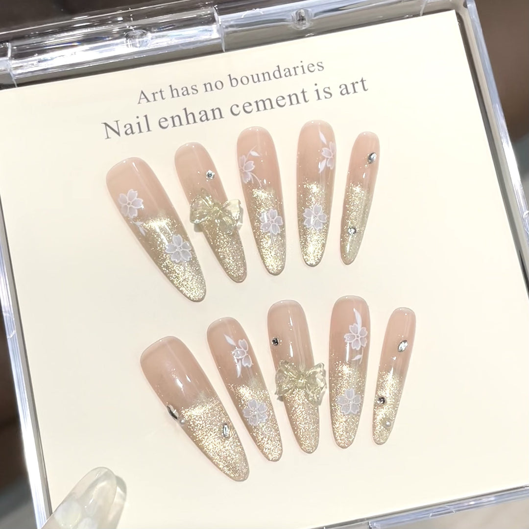 Decorative Press-On Nails with Floral Accents and Glitter