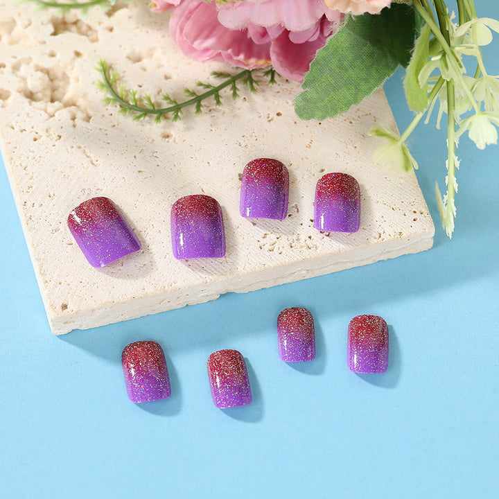 Glittering artificial nails with gradient Stornfield