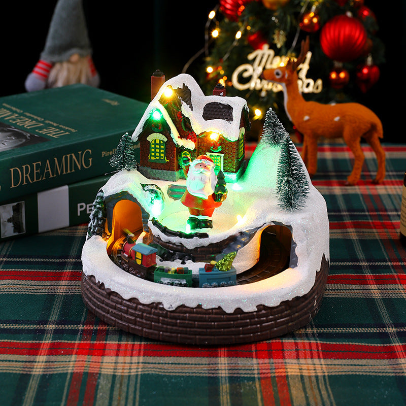 Illuminated Christmas village decoration with moving figures Stornfield