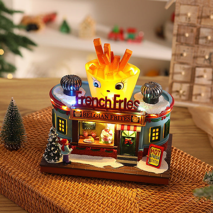 Illuminated Christmas village decoration with moving figures Stornfield