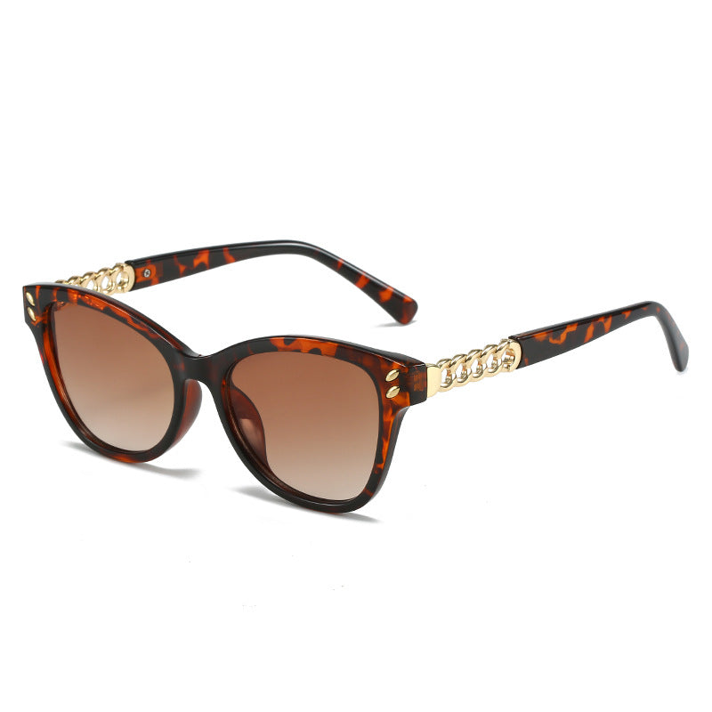 Ladies fashionable cat-eye sunglasses with luxurious chain accents Stornfield