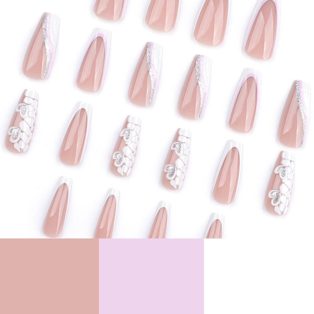 Artful Nail Extensions with Heart Design and Glitter Accents Stornfield