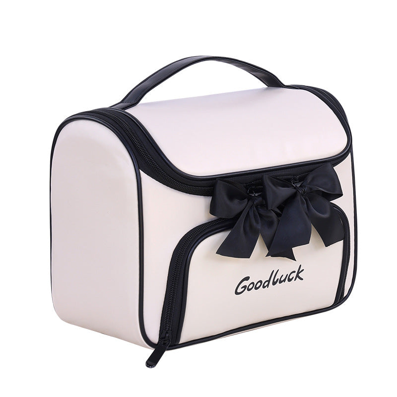 Cosmetic and toiletry bag with elegant bow accent Stornfield