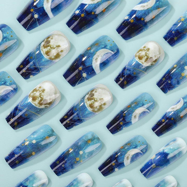 Dreamy artificial nails with moon and star design Stornfield