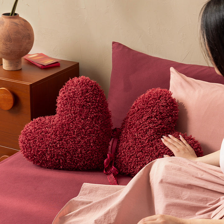 Decorative bow accent cushion with soft-touch cover