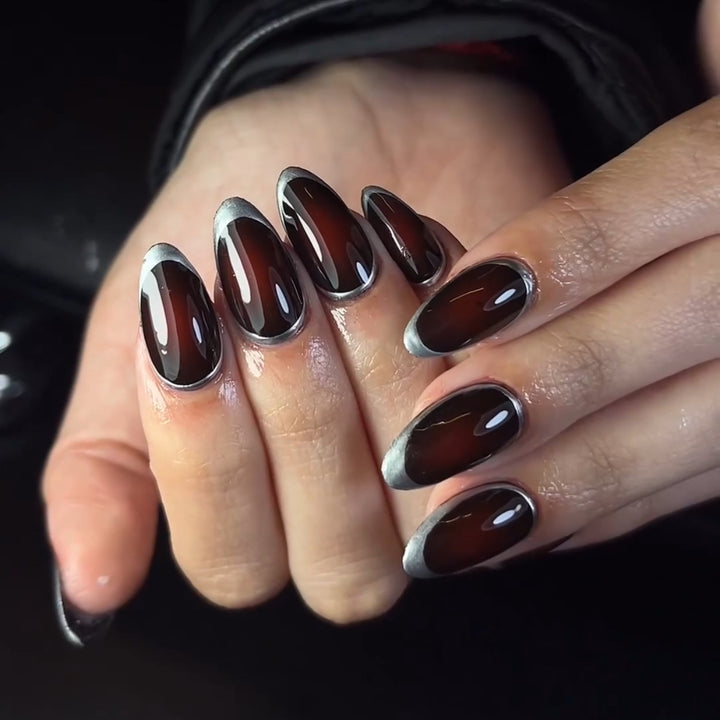 Stylish stiletto nails with elegant shine Stornfield
