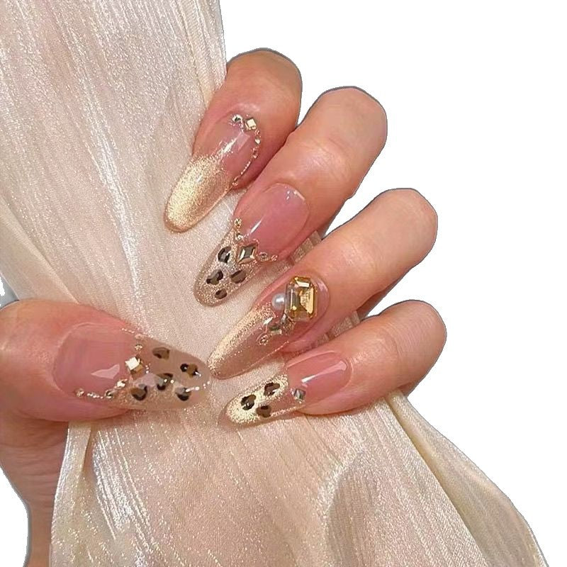 Glamorous artificial nails with creative 3D applications Stornfield