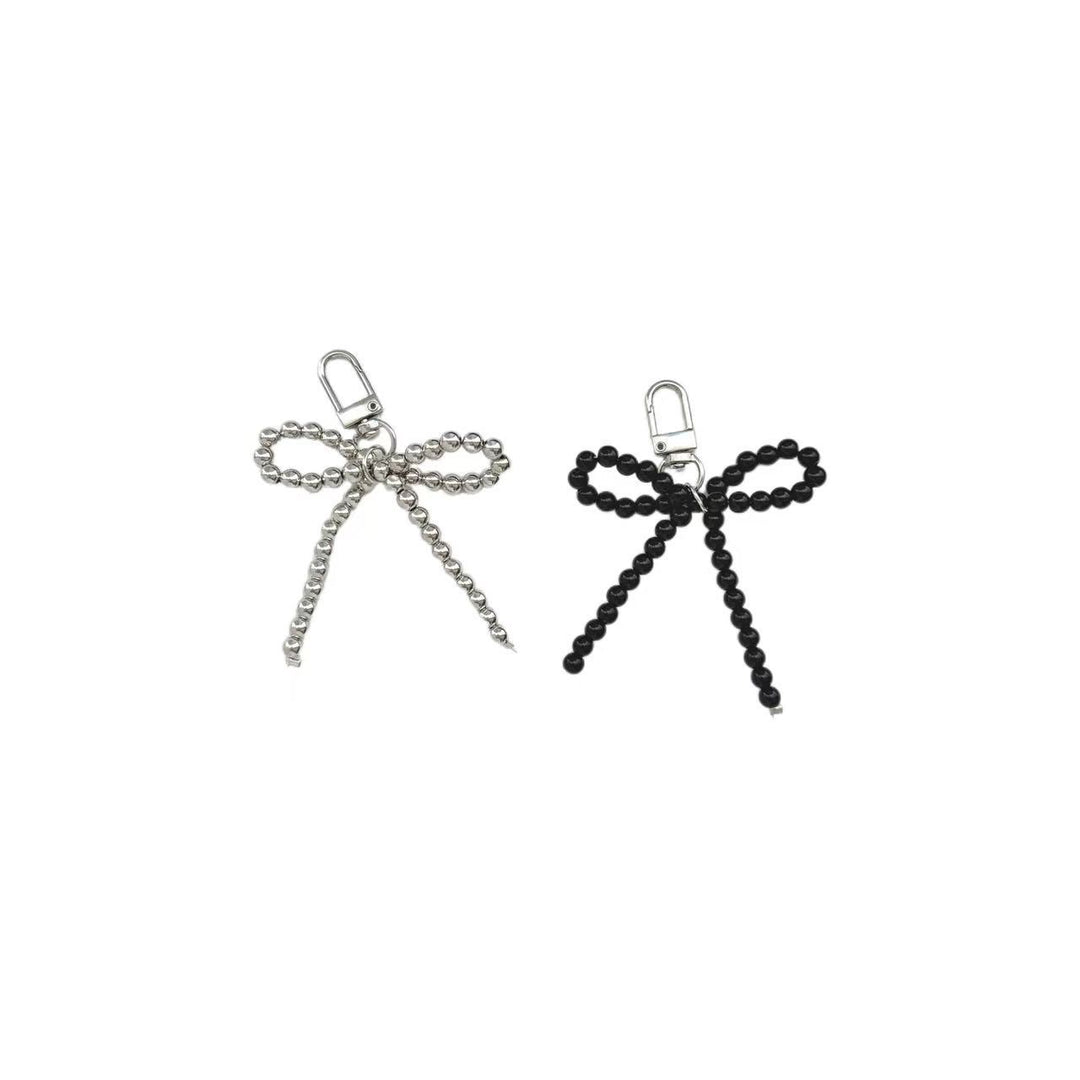 Elegant Pearl Bow Keychain Stornfield