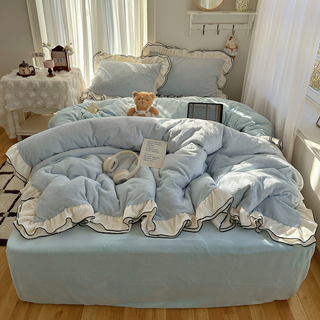 Cozy quilted bedding set with relief ribbon embroidery and contrasting ruffle edge