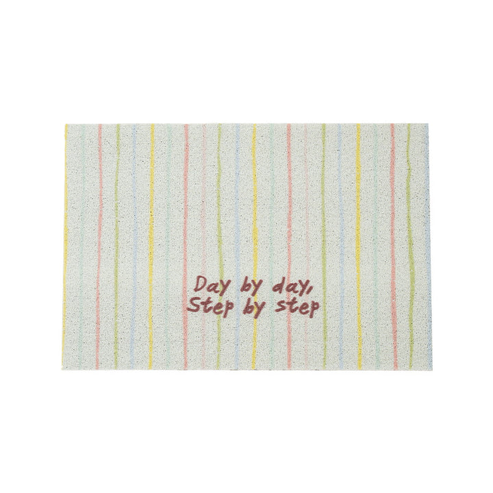Woven door mat with welcome inscription, striped pattern and non-slip back