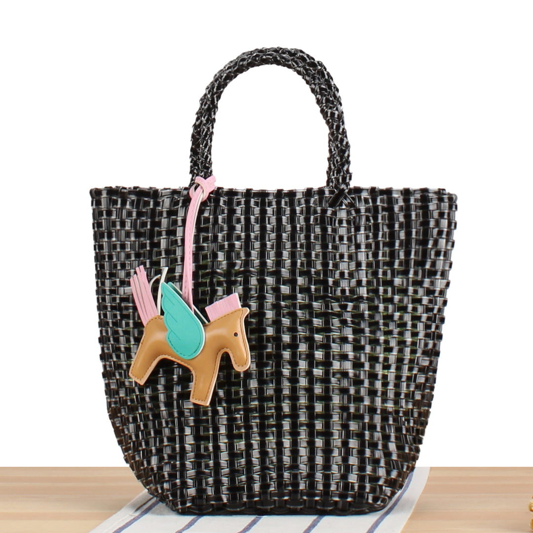 Playful basket bag with unique pendant Stornfield