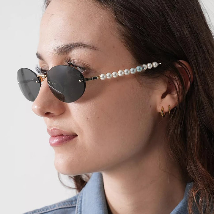 Women's stylish oval sunglasses with elegant embellishments Stornfield