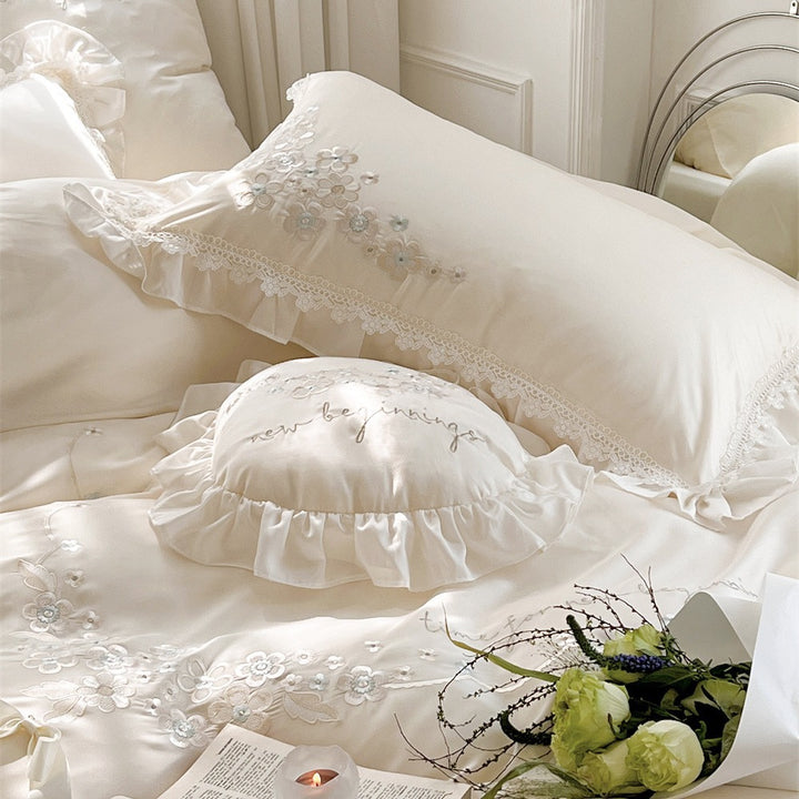 Victorian-inspired cotton satin bedding set with lace ruffles and bows