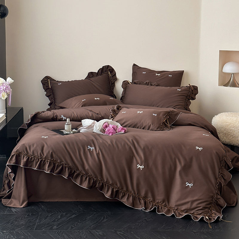 Premium bedding set made of cotton satin with ruffles and bow embroidery