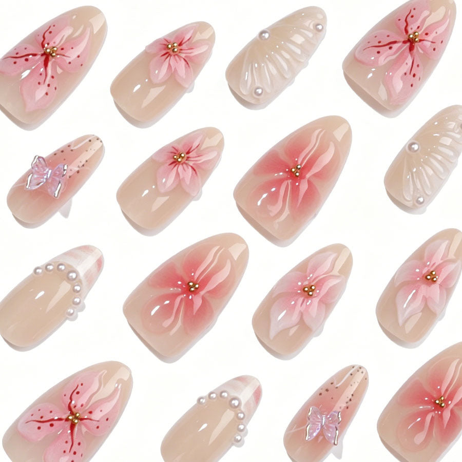 Artificial nail set with floral decorations and 3D accents Stornfield