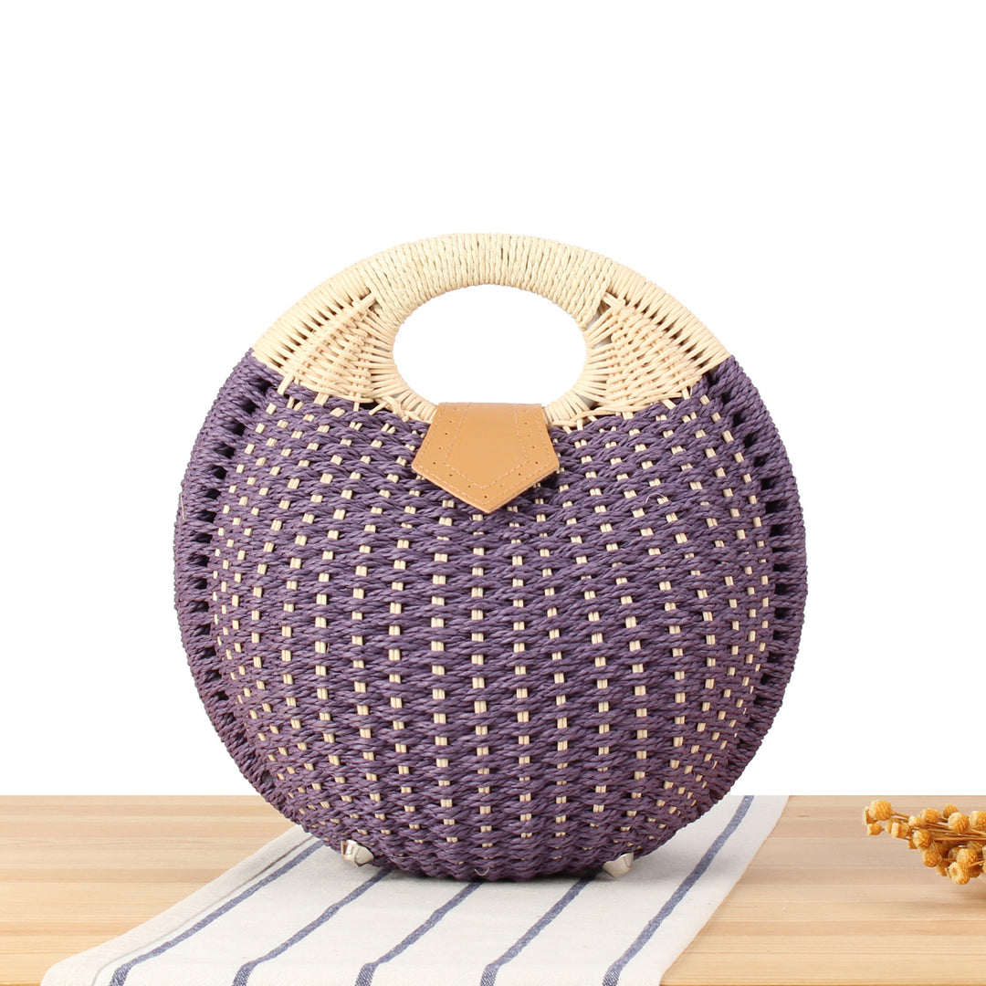 Round straw bag with elegant leather handle Stornfield