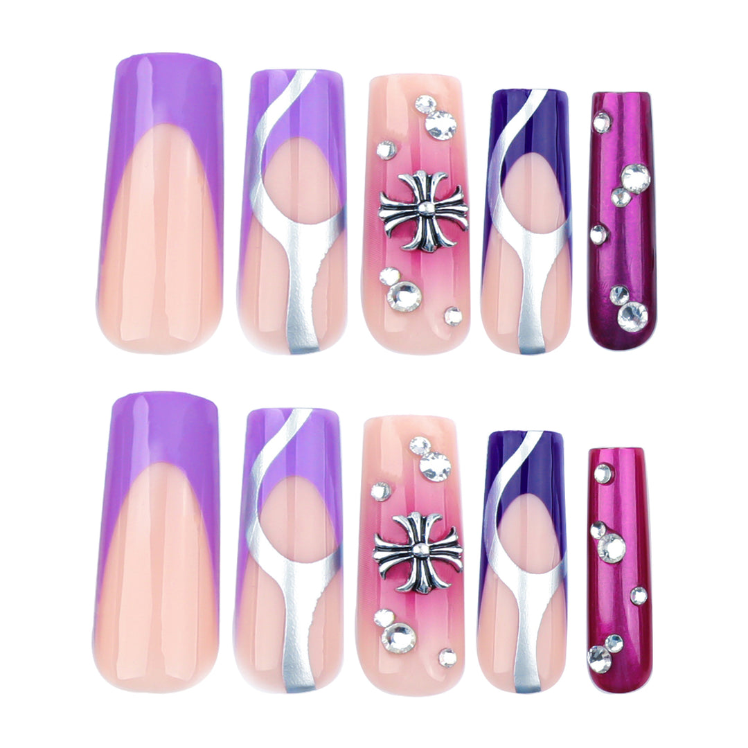 Artistic nail extensions with glitter and flower motifs Stornfield