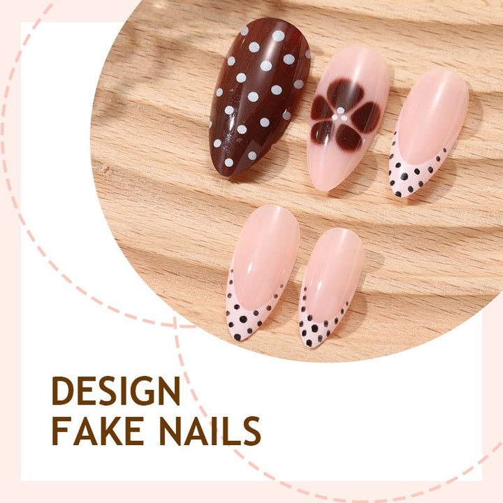 Nail set with elegant dot and flower design Stornfield