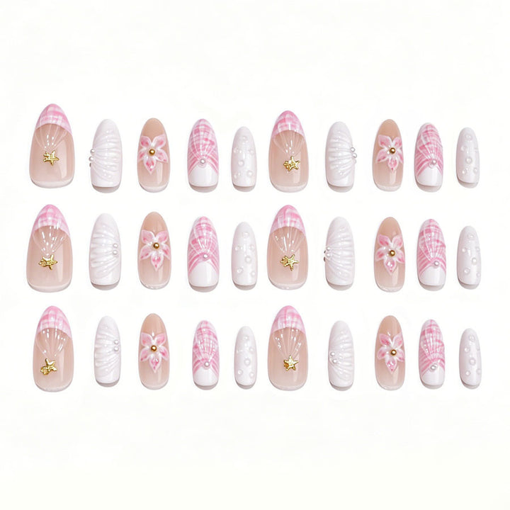 Art nail set with elegant floral decorations and glitter accents Stornfield