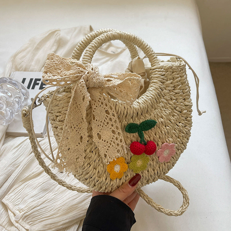 Handcrafted Floral Accent Straw Handbag