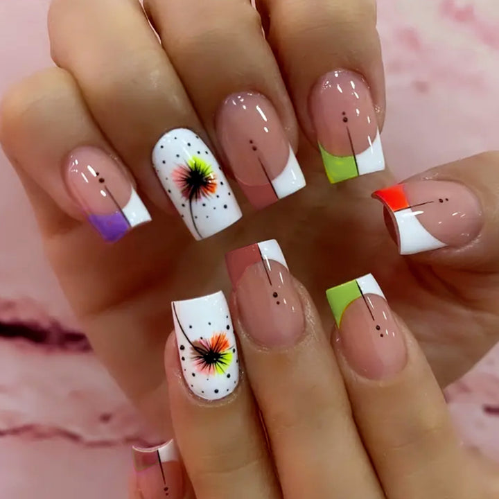 Artful nail art with gradient and floral accents Stornfield