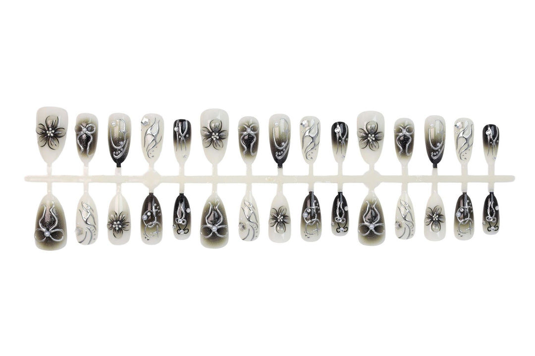 Artificial nails with elegant floral and glittering decorations Stornfield